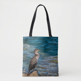 Grote aalscholver op de rotsen tote bag