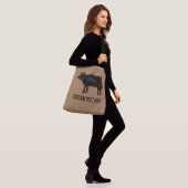 Grote cross-body tas met zwart koe silhouet (Op model)