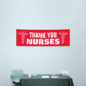 Grote dank u teken voor verpleegkundigen met caduc spandoek (Beurs)