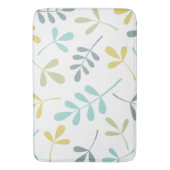 Grote geassorteerde blaadjes kleurenmix op wit badmat (Voorkant Verticaal)