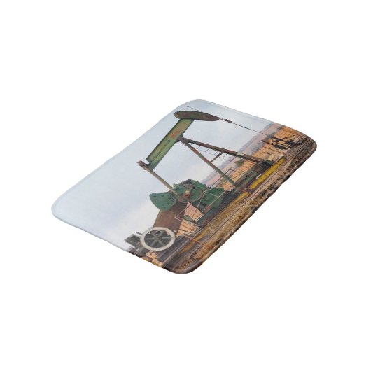 Grote groene pomp in een olieveld badmat (Gekanteld)