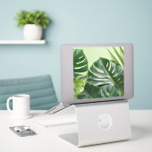 Grote kamerplant bladeren met tekstruimte sticker (Laptop op bureau)