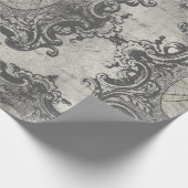 Grote omhulde spin op lichte grijs cadeaupapier (Hoek)