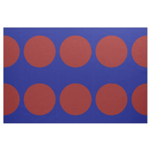 Grote rode stippen op blauwe geometrische verbindi stof