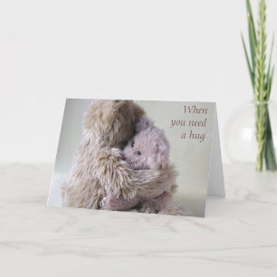 Grote teddybeer houdt kleine beren knuffel vast kaart