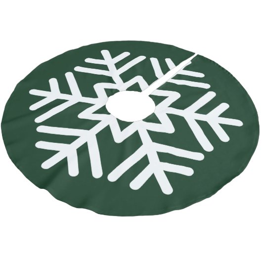 Grote witte sneeuwvlok op bos groen kerstboom rok (Gekanteld)