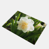 Grote witte vlekken op een lentedag deurmat (Schuin)