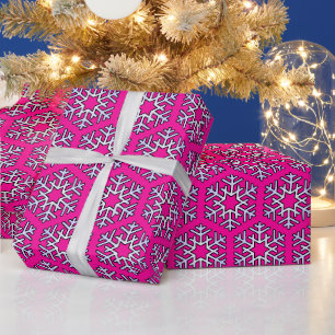 Grote zilveren sneeuwvlokken op hete roze cadeaupapier