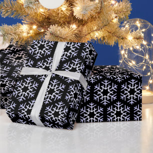Grote zilveren sneeuwvlokken op zwart cadeaupapier