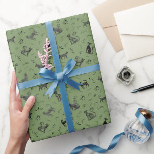 Grottenkunstkatten op groen cadeaupapier