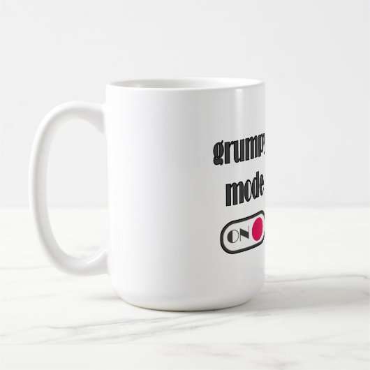 Grumpy mode op mok met gefrituurde kattenkoffie (Links)