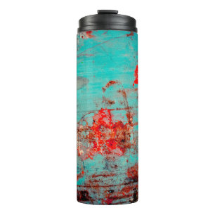 Grunge background of turquoise. Blokken, uitstrijk Thermosbeker