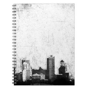 Grungy city background in zwart-wit notitieboek