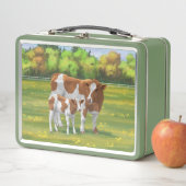 Guernsey Koe en Cute Calf in Summer Pasture (In situ)