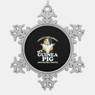 Guinese varken waar ik om geef... tin sneeuwvlok ornament