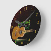 Guitarra española con Giralda de Sevilla y silla. Ronde Klok (Hoek)