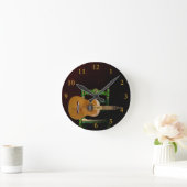 Guitarra española con Giralda de Sevilla y silla. Ronde Klok (Huis)