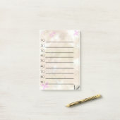 Gulden bloem om een lijst te maken post-it® notes (Op bureau)