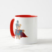 Gulden in superheldhaftig pluche met een goed en g mok (Voorkant links)