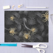 Gulden spinnen op zwart papier (Craft)