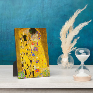 Gustav Klimt is het beroemde schilderij The Kiss. Fotoplaat