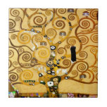 Gustav Klimt Levensboom: Art Nouveau Symbolist Tegeltje<br><div class="desc">Verhoog uw ruimte met dit iconische meesterwerk, Gustav Klimt's "Tree of Life" (van de Stoclet Frieze). Dit beroemde art nouveau-kunstwerk boeit met zijn wervelende gouden takken, ingewikkelde patronen en symbolische motieven die de reis, verbinding en groei van het leven vertegenwoordigen. Klimt's kenmerkende gebruik van rijk, glinsterend goud, mozaïekachtige details en...</div>