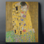 Gustav Klimt "The Kiss" Fotoplaat<br><div class="desc">Gustav Klimt's meesterwerk: "De kus". "De Kus", gemaakt door de Oostenrijkse schilder Gustav Klimt. Het wordt beschouwd als zijn beroemdste werk. Hij schilderde het tussen de jaren 1907 en 1908, het hoogtepunt van zijn "Golden Period", toen hij een aantal werken schilderde met gouden bladeren. Oostenrijk beschouwt "De Kus" als een...</div>