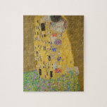 Gustav Klimt "The Kiss" Legpuzzel<br><div class="desc">Gustav Klimt's meesterwerk: "De kus". "De Kus", gemaakt door de Oostenrijkse schilder Gustav Klimt. Het wordt beschouwd als zijn beroemdste werk. Hij schilderde het tussen de jaren 1907 en 1908, het hoogtepunt van zijn "Golden Period", toen hij een aantal werken schilderde met gouden bladeren. Oostenrijk beschouwt "De Kus" als een...</div>