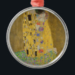 Gustav Klimt "The Kiss" Metalen Ornament<br><div class="desc">Gustav Klimt's meesterwerk: "De kus". "De Kus", gemaakt door de Oostenrijkse schilder Gustav Klimt. Het wordt beschouwd als zijn beroemdste werk. Hij schilderde het tussen de jaren 1907 en 1908, het hoogtepunt van zijn "Golden Period", toen hij een aantal werken schilderde met gouden bladeren. Oostenrijk beschouwt "De Kus" als een...</div>