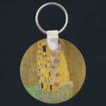 Gustav Klimt "The Kiss" Sleutelhanger<br><div class="desc">Gustav Klimt's meesterwerk: "De kus". "De Kus", gemaakt door de Oostenrijkse schilder Gustav Klimt. Het wordt beschouwd als zijn beroemdste werk. Hij schilderde het tussen de jaren 1907 en 1908, het hoogtepunt van zijn "Golden Period", toen hij een aantal werken schilderde met gouden bladeren. Oostenrijk beschouwt "De Kus" als een...</div>