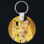 Gustav Klimt The Kiss Sleutelhanger<br><div class="desc">Gustav Klimt The Kiss sleutelketen. Schilder van kunststofolie op doek van 1907-1908. De Kus is het bekendste schilderij van Gustav Klimt,  een prachtig werk dat de hoogte van zijn gouden periode weergeeft. Een perfect cadeau voor liefhebbers van het Oostenrijkse symboliek,  Gustav Klimt,  en mooie kunst.</div>