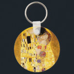 Gustav Klimt The Kiss Sleutelhanger<br><div class="desc">Gustav Klimt The Kiss sleutelketen. Schilder van kunststofolie op doek van 1907-1908. De Kus is het bekendste schilderij van Gustav Klimt, een prachtig werk dat de hoogte van zijn gouden periode weergeeft. Een perfect cadeau voor liefhebbers van het Oostenrijkse symboliek, Gustav Klimt, en mooie kunst.</div>