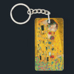 Gustav Klimt The Kiss Sleutelhanger<br><div class="desc">Sleutelhanger met olieverf van Gustav Klimt met goudblad The Kiss (1908). Een man en een vrouw,  met briljante gouden kleuren,  omarmen en kussen op een bloesem. Een groot geschenk voor fans van Art Nouveau en Oostenrijkse kunst.</div>