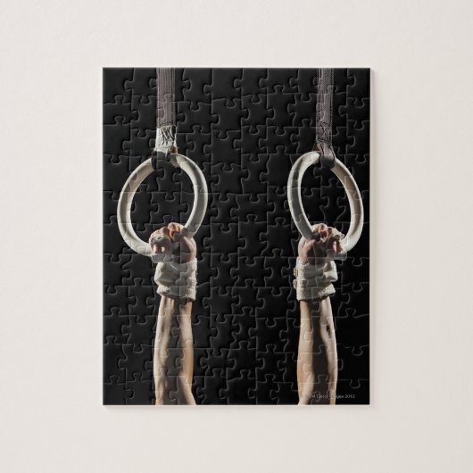 Gymnast die van ringen 2 zwemt legpuzzel (Verticaal)