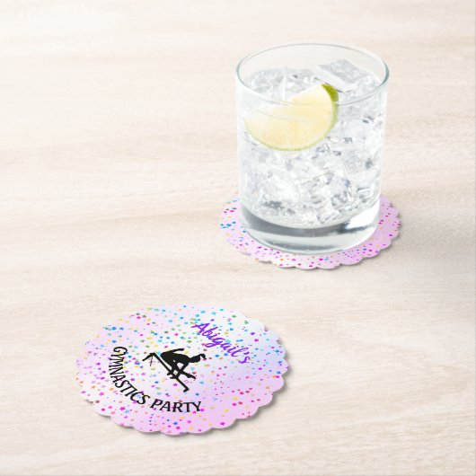 Gymnastiekschaduwen van kleur en sterren over de h kartonnen onderzetters (Insitu)