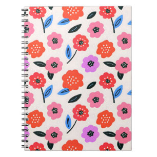 Haan tekent bloemenpatroon notitieboek