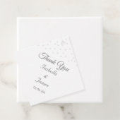 Haarparels op het zwarte en witte huwelijk bedankjes labels (In situ)