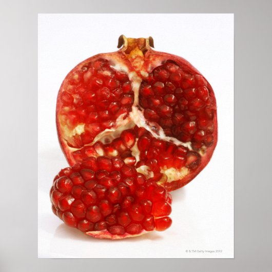 Half a ripe pomegranate cut to expose the juicy poster (Voorkant)
