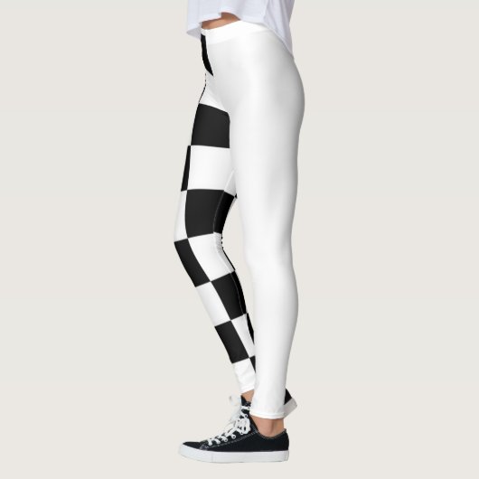 Halfzwarte en witte leggings (Links)