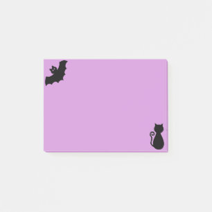 Halloween bat en zwarte kat op violet post-it® notes