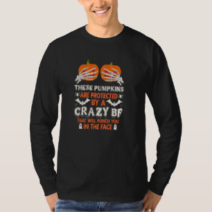 Halloween Deze pompoenen worden beschermd door een T-shirt