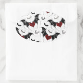 Halloween hart met zwarte vleugels ovale sticker (Tas)