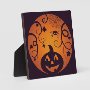Halloween Jack o lantaarn pompoen gezicht en spin Fotoplaat