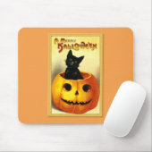 Halloween Kitty zit in Jack O Lantern Muismat (Met muis)