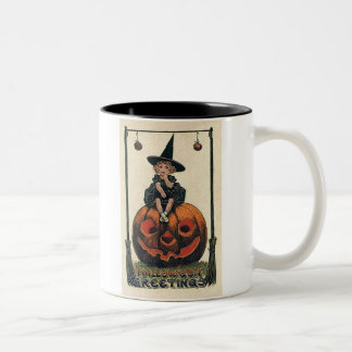 -halloween-meisje-heks-pompoen-zwart-wit- tweekleurige koffiemok
