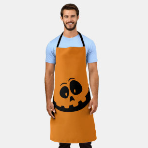 Halloween oranje pompoen met een spookachtig gezic schort