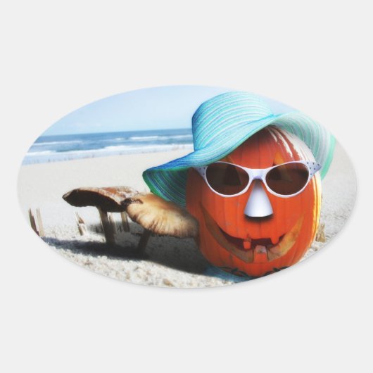 Halloween pompoen aan het strand ovale sticker (Voorkant)