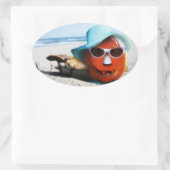 Halloween pompoen aan het strand ovale sticker (Tas)