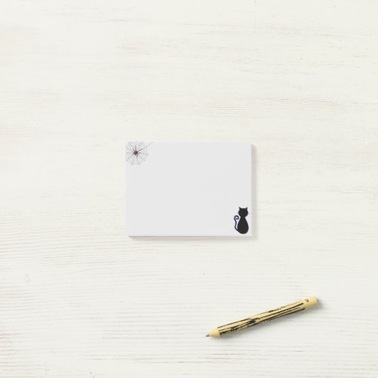 Halloween spin en zwarte kat post-it® notes (Op bureau)