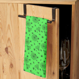 Halloween spinnen en webben op groen theedoek